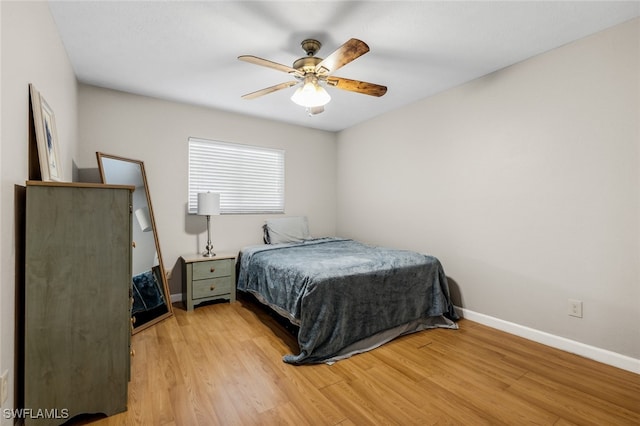 bedroom featuring ceiling fan and light hardwood / wood-style flooring