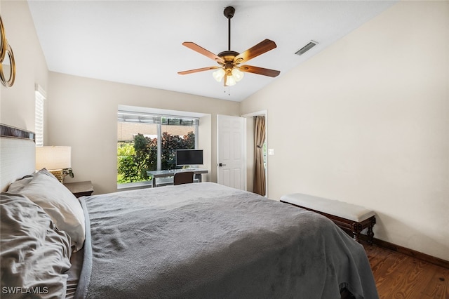 bedroom with ceiling fan, dark hardwood / wood-style flooring, and lofted ceiling