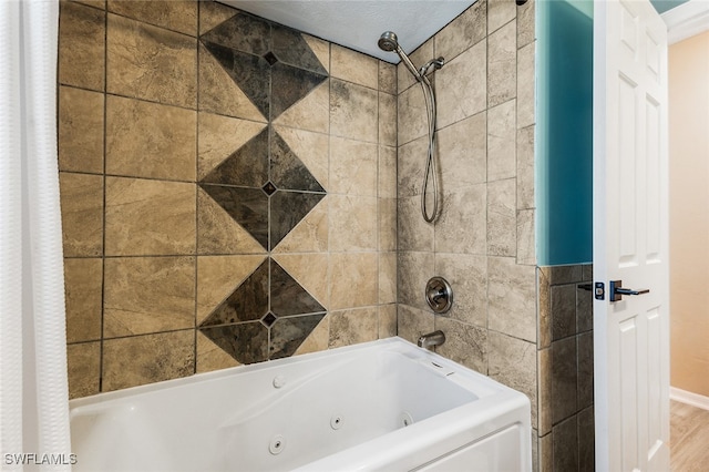 bathroom featuring shower / bath combo and wood-type flooring