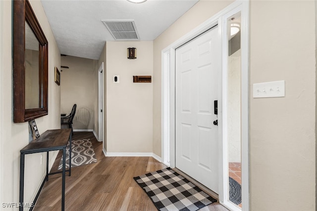 entrance foyer with wood-type flooring