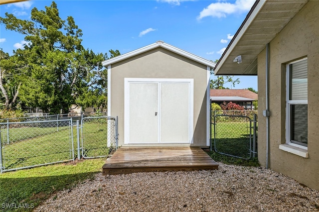 view of outbuilding featuring a yard