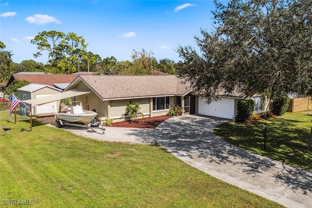 ranch-style house featuring a garage and a front lawn