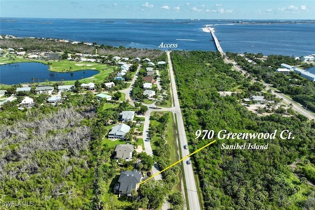 bird's eye view with a water view