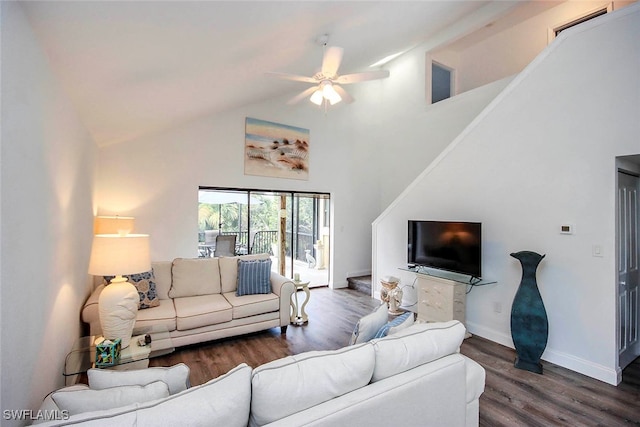 living room with ceiling fan, high vaulted ceiling, and dark wood-type flooring