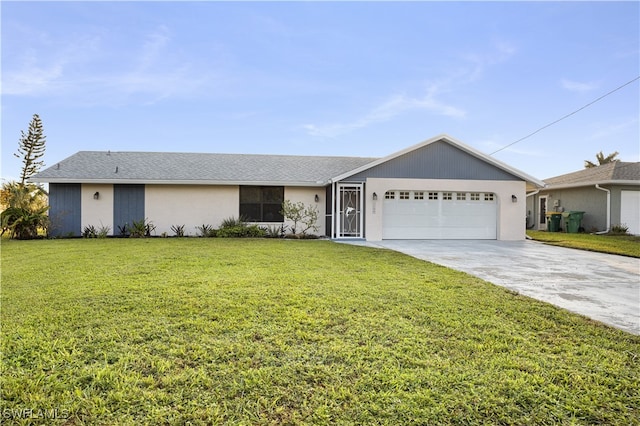 ranch-style house featuring a front yard and a garage