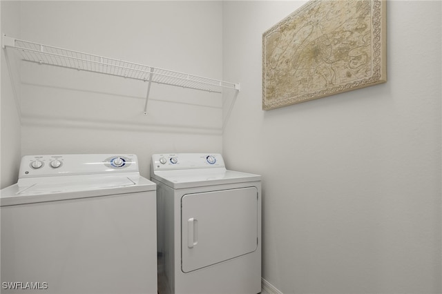 laundry area featuring washer and clothes dryer