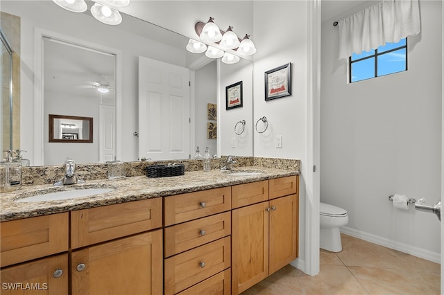 bathroom featuring vanity, an enclosed shower, toilet, and tile patterned flooring