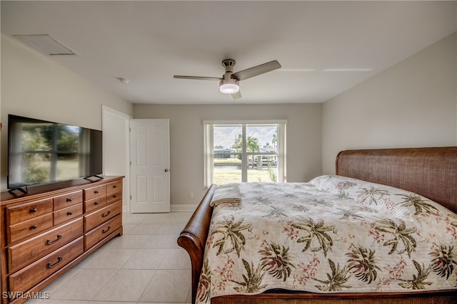 bedroom featuring ceiling fan and light tile patterned floors