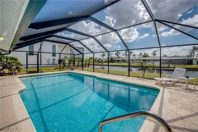 1106 Lorraine Ct, Cape Coral, FL 33904 - swimming pool featuring a water view, a patio, and a lanai