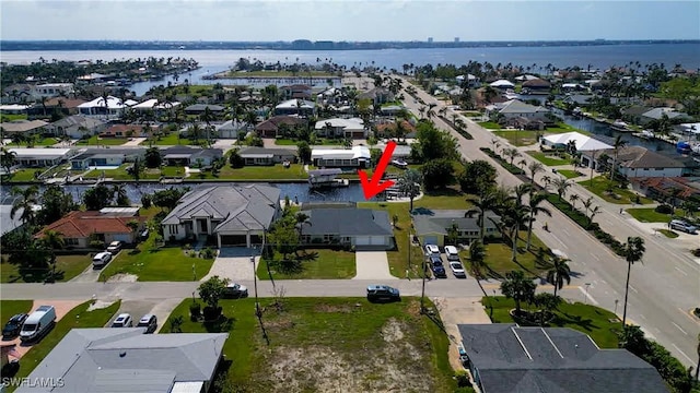 1106 Lorraine Ct, Cape Coral, FL 33904 - view of property location with nearby suburban area and a nearby body of water