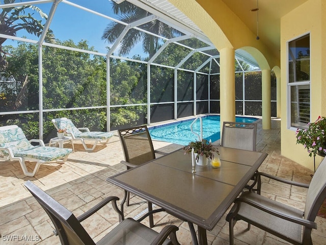 1442 Biscayne Way, Marco Island, FL 34145 - view of patio / terrace featuring glass enclosure and an outdoor pool