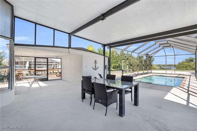 interior space with lofted ceiling with beams