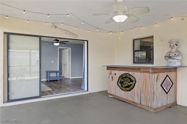 interior space featuring hardwood / wood-style flooring and ceiling fan