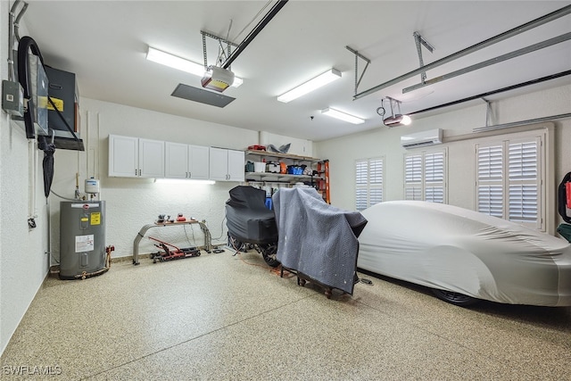 garage with electric water heater, a garage door opener, and a wall mounted AC