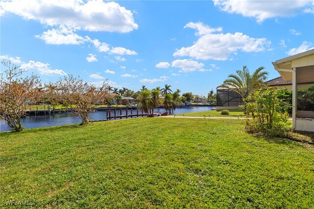 4709 SW 25th Pl, Cape Coral, FL 33914 - view of grassy yard with a water view