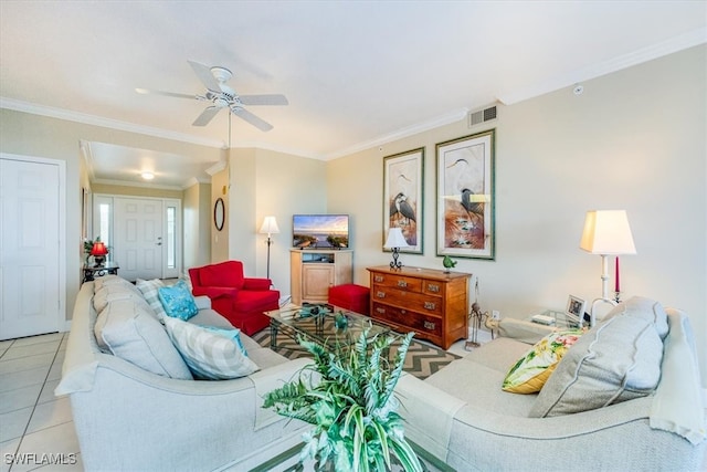 living room featuring ceiling fan, light tile patterned flooring, and crown molding