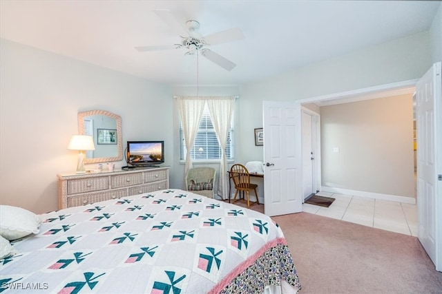 bedroom featuring ceiling fan and light colored carpet