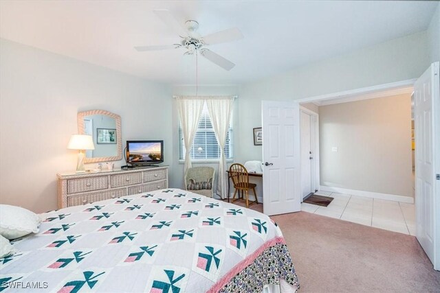 133 Vintage Bay Dr Unit 16, Marco Island, FL 34145 - tiled bedroom featuring carpet, ceiling fan, and baseboards