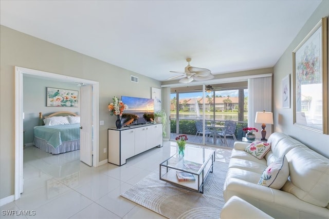 living room featuring ceiling fan