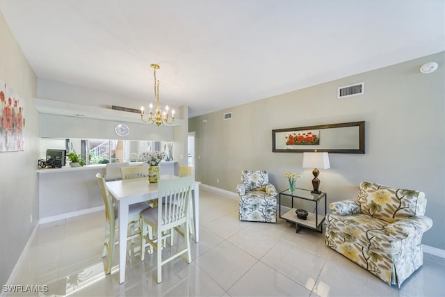 dining space with a notable chandelier and light tile patterned floors