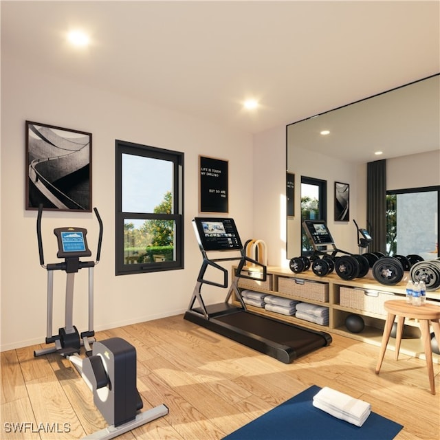 workout room with wood-type flooring