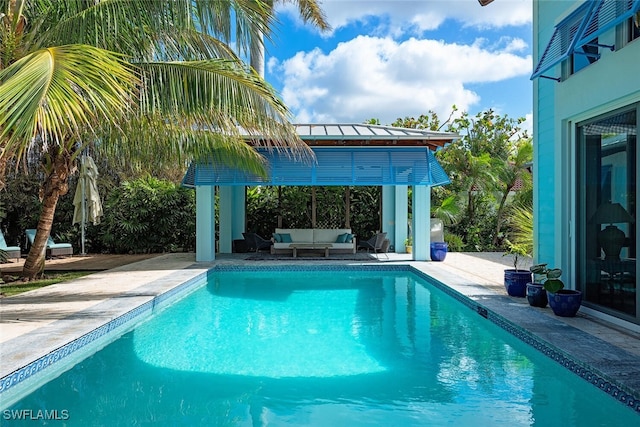 view of swimming pool featuring a patio area and outdoor lounge area