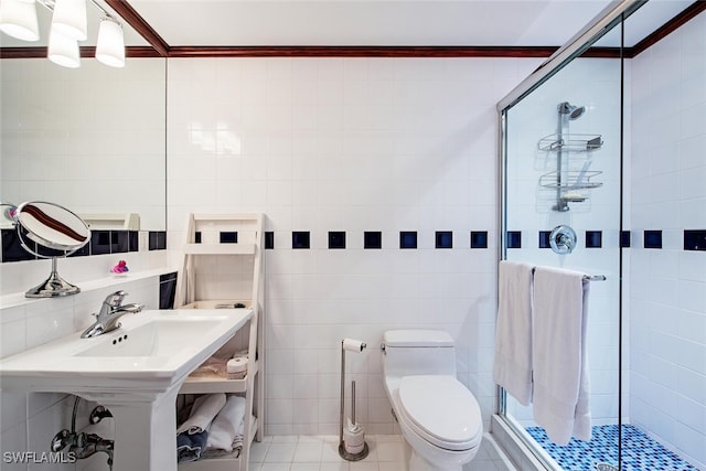 bathroom with tile walls, toilet, walk in shower, and tile patterned floors