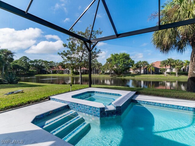 view of pool with a water view, a yard, an in ground hot tub, and glass enclosure