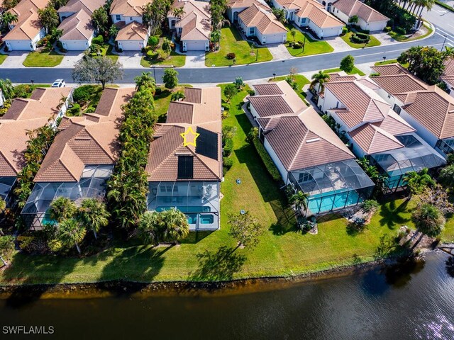 bird's eye view with a water view