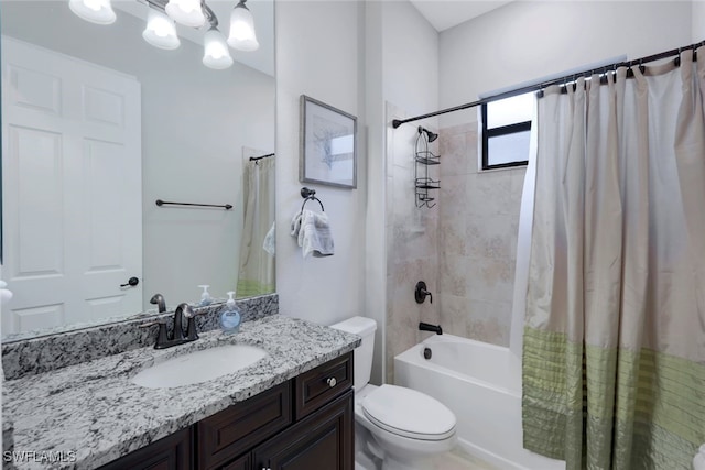 full bathroom with vanity, toilet, a notable chandelier, and shower / tub combo