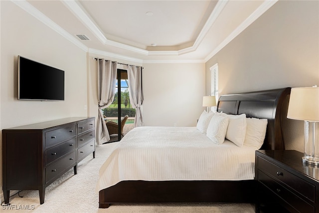 bedroom featuring access to outside, light carpet, a raised ceiling, and ornamental molding