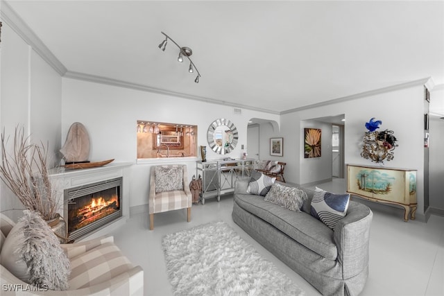 living room featuring tile patterned floors and crown molding