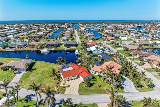 drone / aerial view with a water view