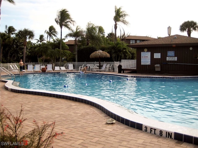 view of swimming pool featuring a patio area