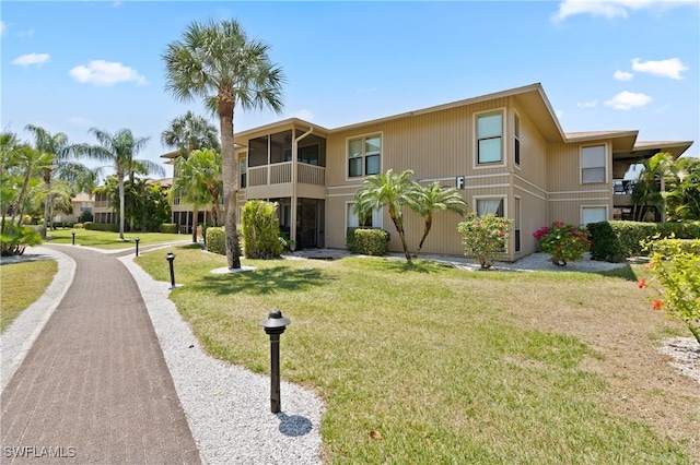 exterior space featuring a front lawn