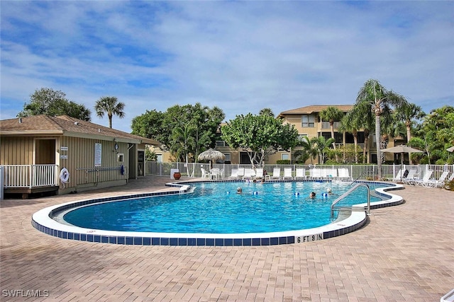 view of pool featuring a patio