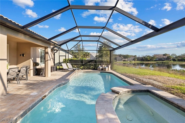 view of swimming pool with a lanai, a patio area, a water view, and an in ground hot tub