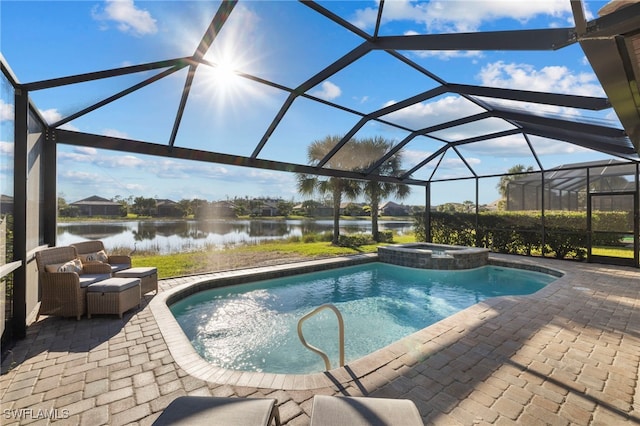 view of swimming pool with glass enclosure, a patio area, and a water view