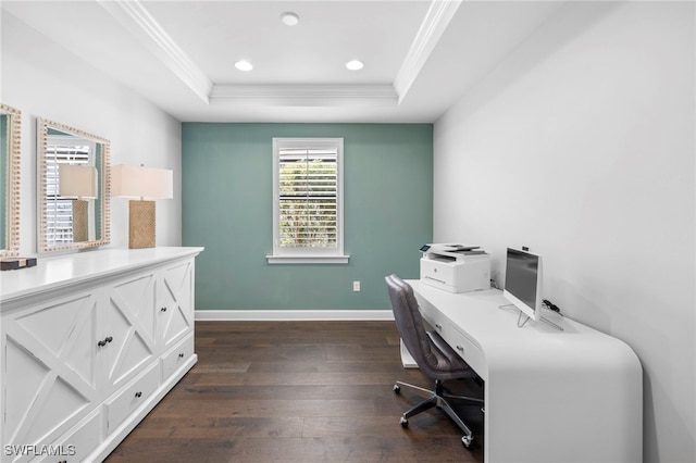 home office featuring a raised ceiling, dark hardwood / wood-style flooring, and crown molding