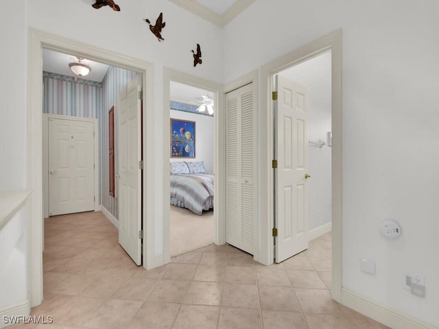 corridor with light tile patterned floors