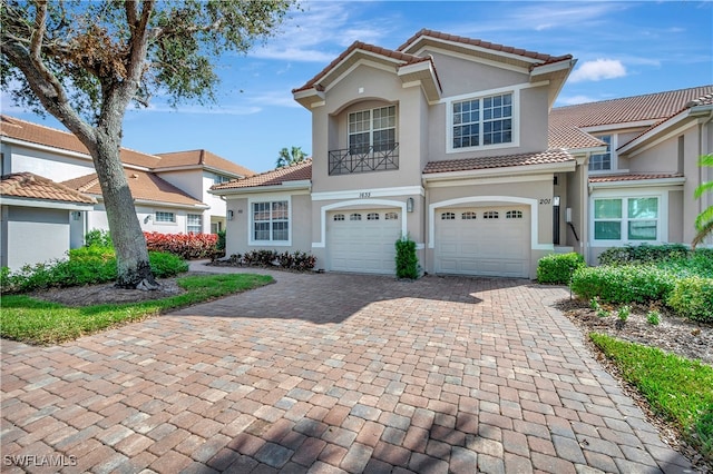 view of front of property with a garage