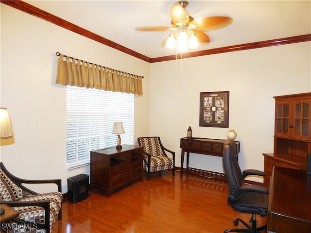 office area with dark hardwood / wood-style flooring, ceiling fan, and ornamental molding