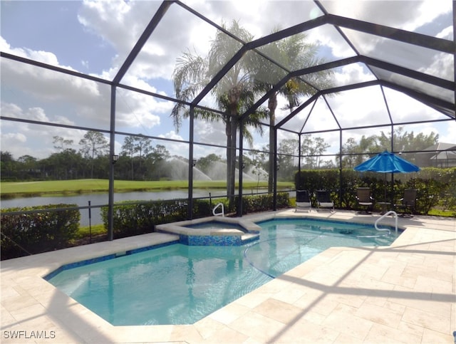 view of swimming pool featuring a patio, glass enclosure, a water view, and an in ground hot tub