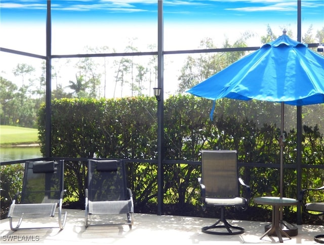 view of patio / terrace with a water view