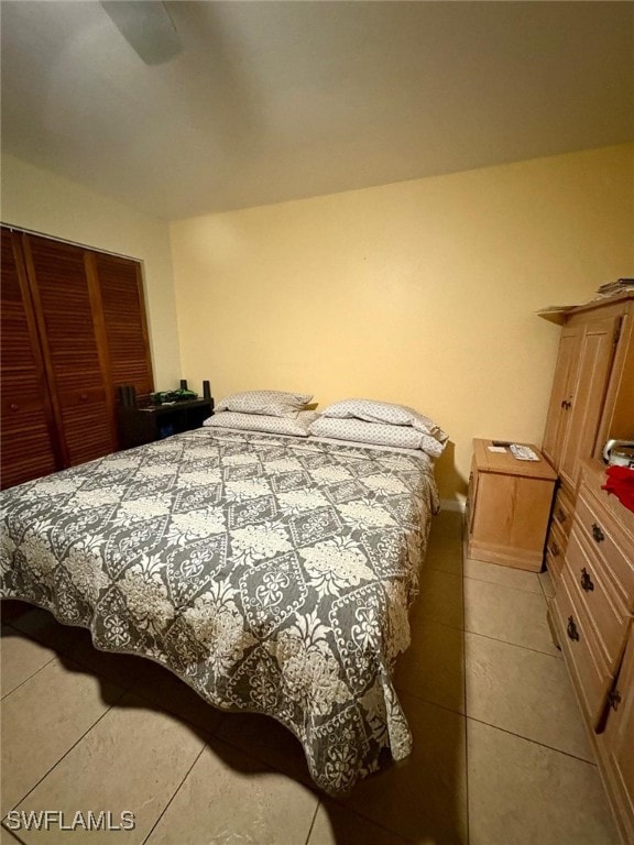 bedroom featuring light tile patterned floors