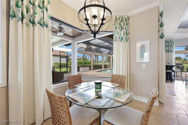 dining area featuring a notable chandelier and crown molding