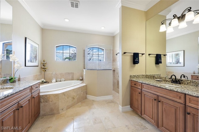 bathroom with crown molding, vanity, and shower with separate bathtub