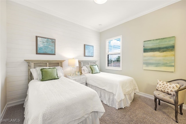 bedroom featuring crown molding and carpet floors