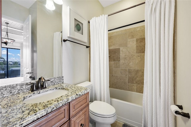 full bathroom with vanity, shower / bathtub combination with curtain, a chandelier, and toilet