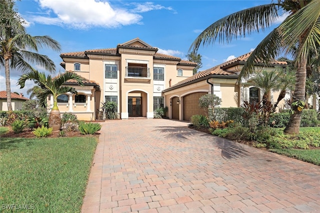 mediterranean / spanish-style house with a balcony